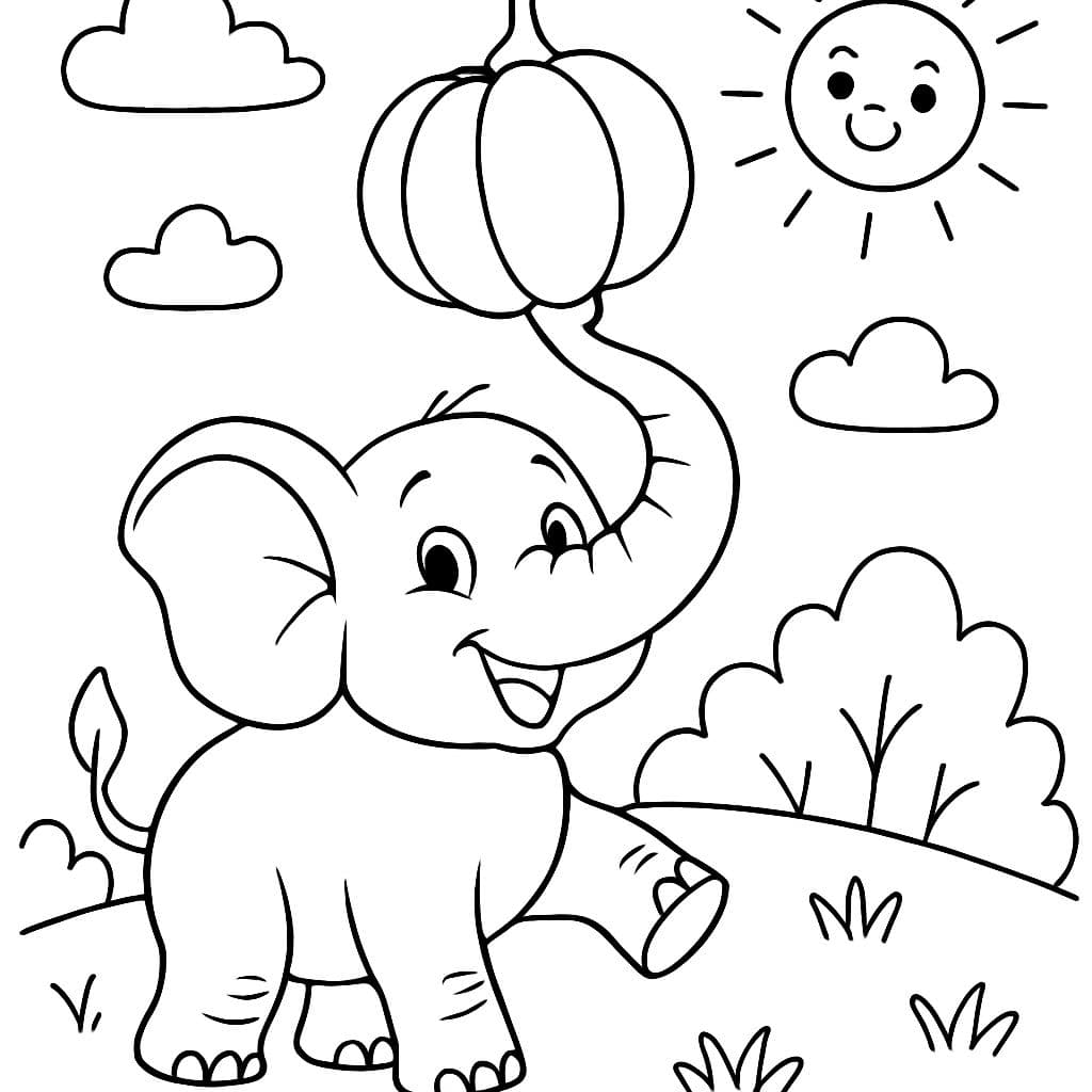 Ein Elefant balanciert einen Kürbis auf seinem Rüssel.