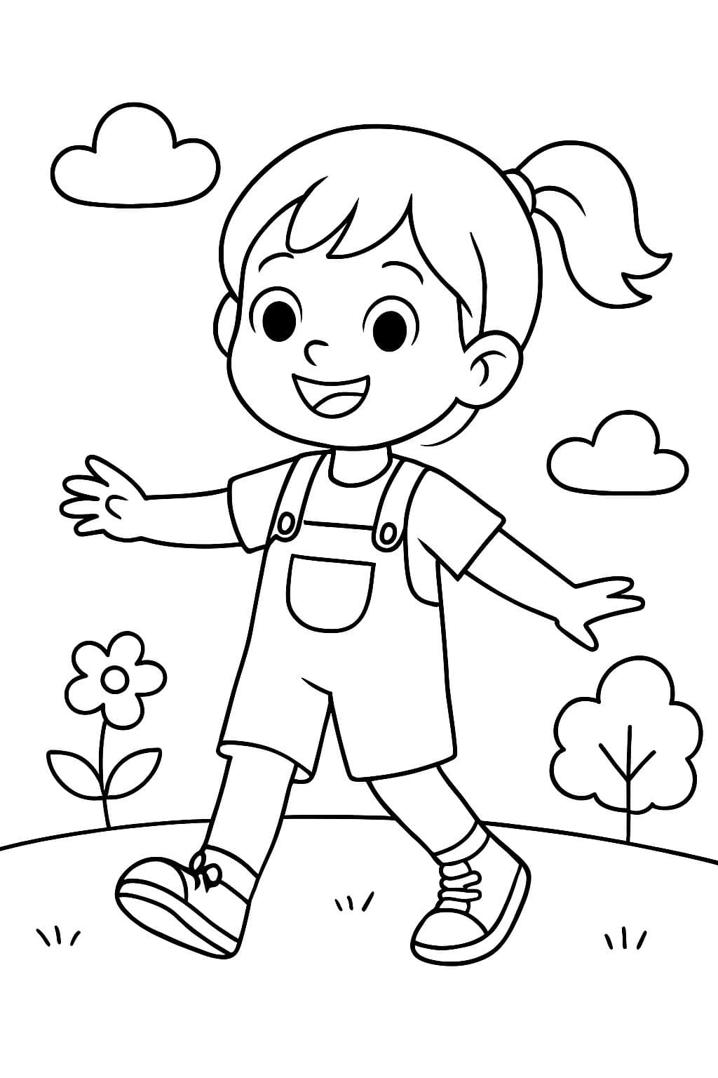 Ein kleines Mädchen trägt ein T-Shirt, Latzhosen und Turnschuhe.