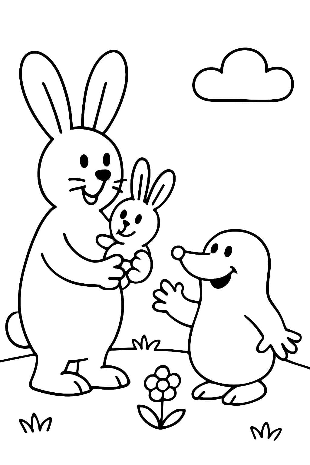 Der Maulwurf rettet das Häschen - Mama Hase ist mit ihren Häschen, das eine Häschen hält sie in der Hand, der Maulwurf ist auch dabei - alle freuen sich