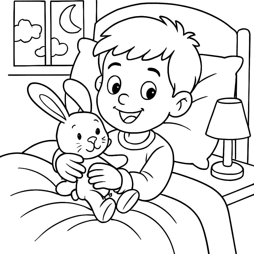Garçon de 6 ans câline un animal en peluche en forme de lapin dans son lit